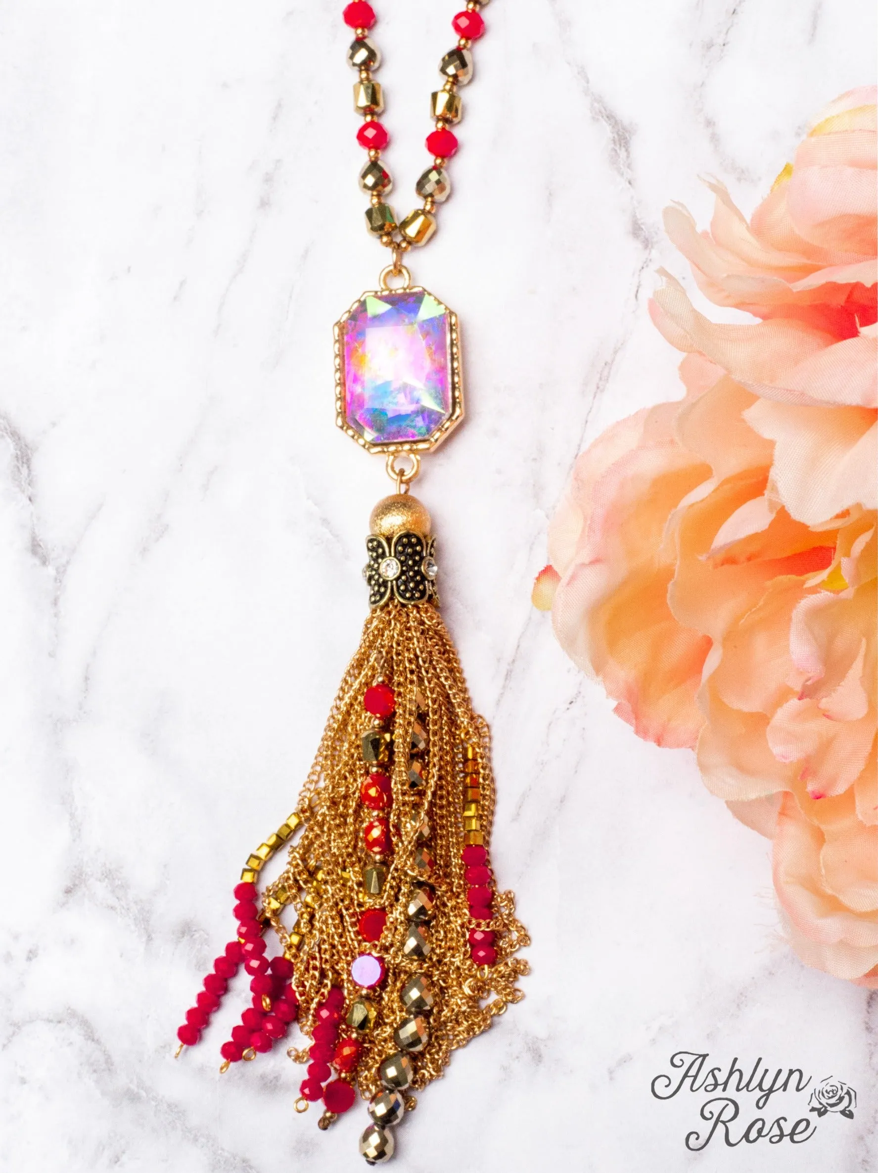 WATCH THE SUNSET WITH ME IRIDESCENT PENDANT WITH GOLD CHAIN TASSELS ON A MIXED CRYSTAL BEADED NECKLACE, RED